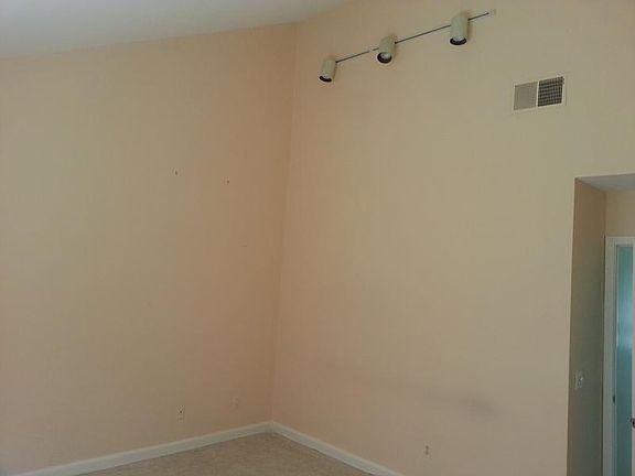 Master bedroom with cathedral ceiling