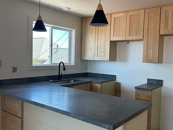 Appliances included but not pictured, including over oven microwave. New quartz countertops