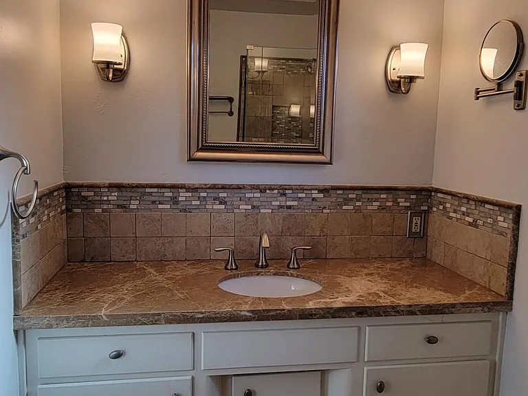 Master Bathroom- medicine cabinet. great lighting