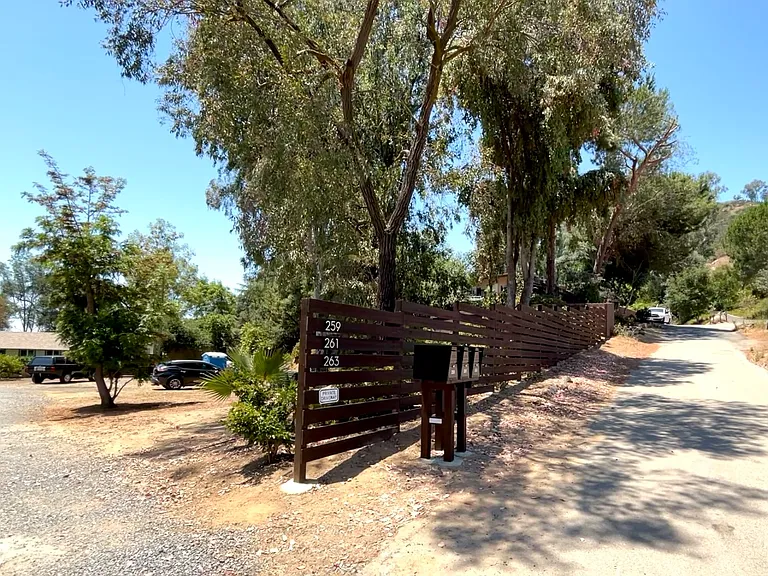 View from road into property driveway.