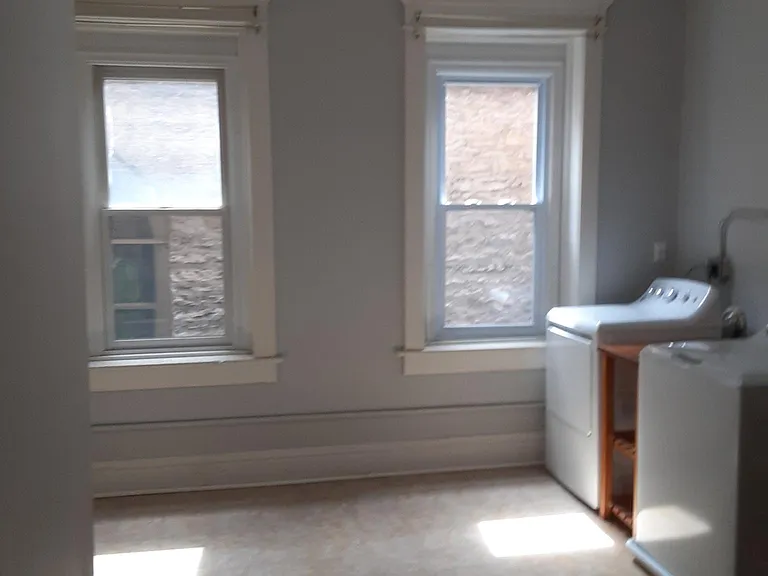 utility room with W/D and furnace