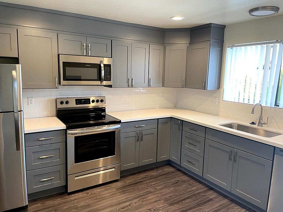 Brand new appliances, counters and cabinets