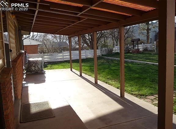 BACK covered patio for all your outdoor barbecues with friends and family.