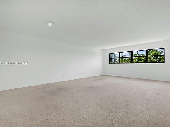 4th image of 3200 Port Royale Dr N APT 404