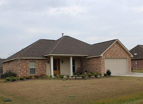 SIDE ANGLE VIEW OF 41235 COVEY RUN WITH LOVELY LANDSCAPING