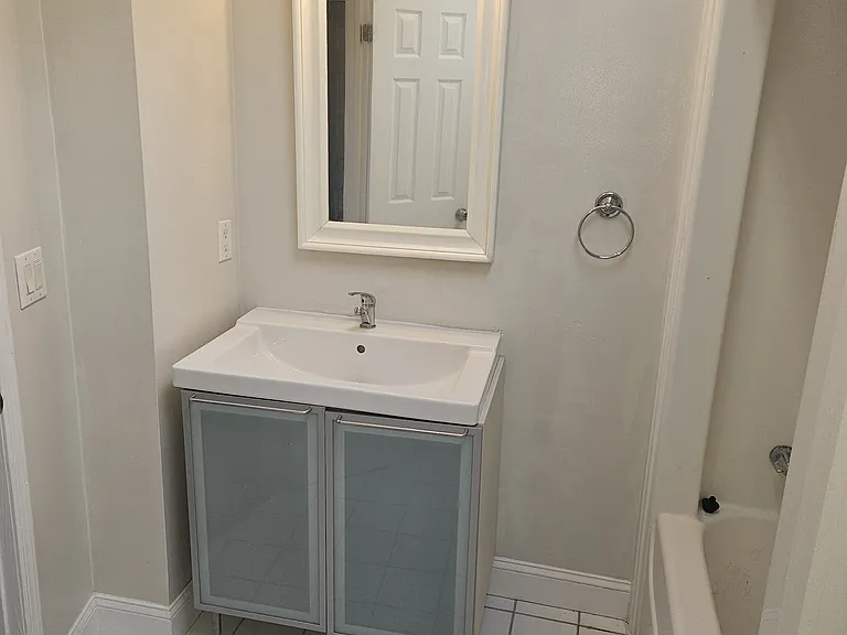 Large bathroom with tub and shower