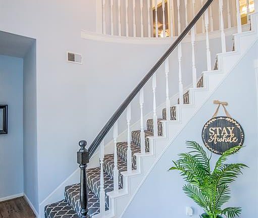 Imagine years of family photos on this staircase.