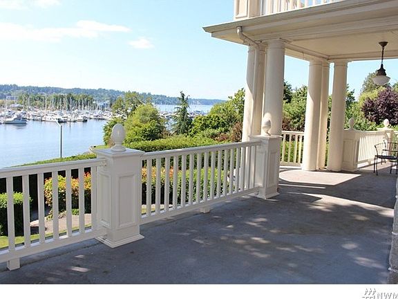 Grand porch with large covered area the perfect place to enjoy the views year round.