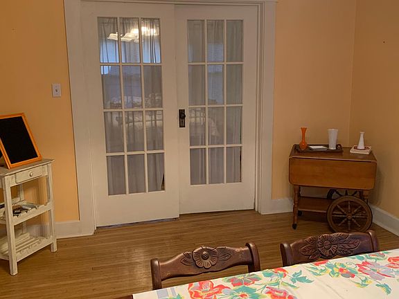 Dining room looking at French doors to master bedroom.