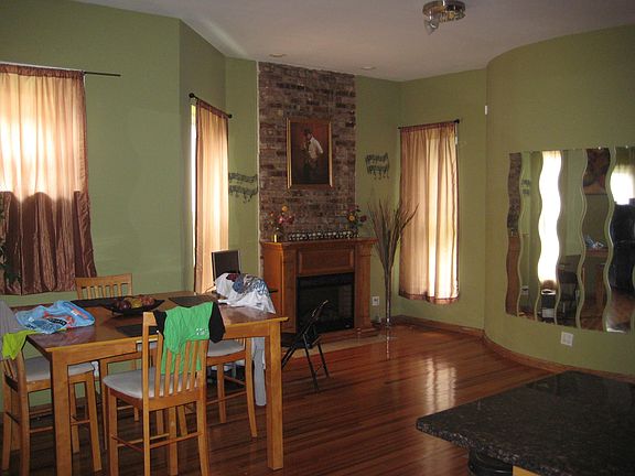 other side of kitchen with Fireplace and seperate Diningroom