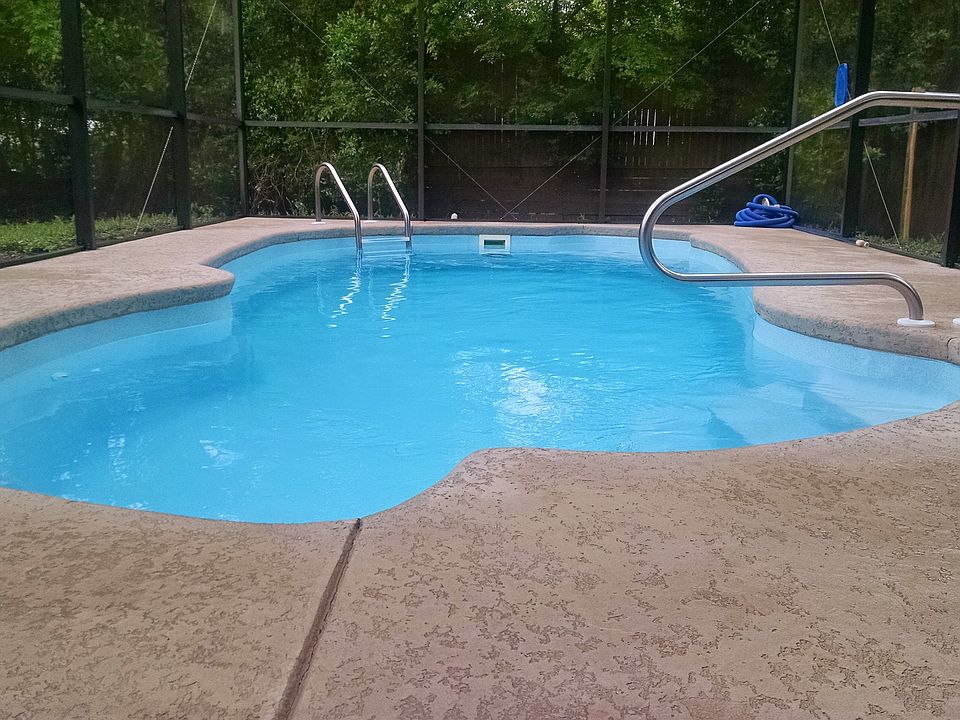 In-ground fiberglass pool.