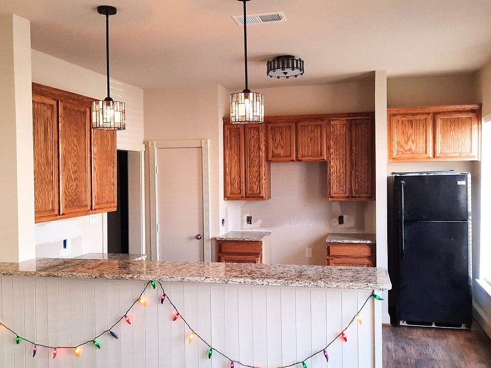 New kitchen cabinets with new granite