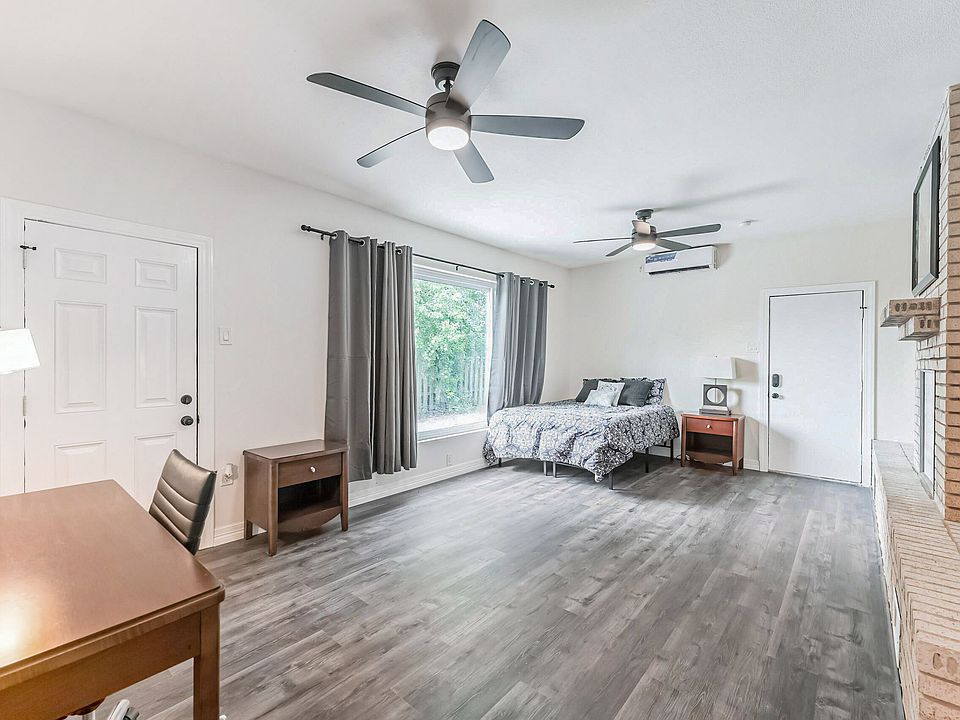 Largest room located in back of home with separate entrance.