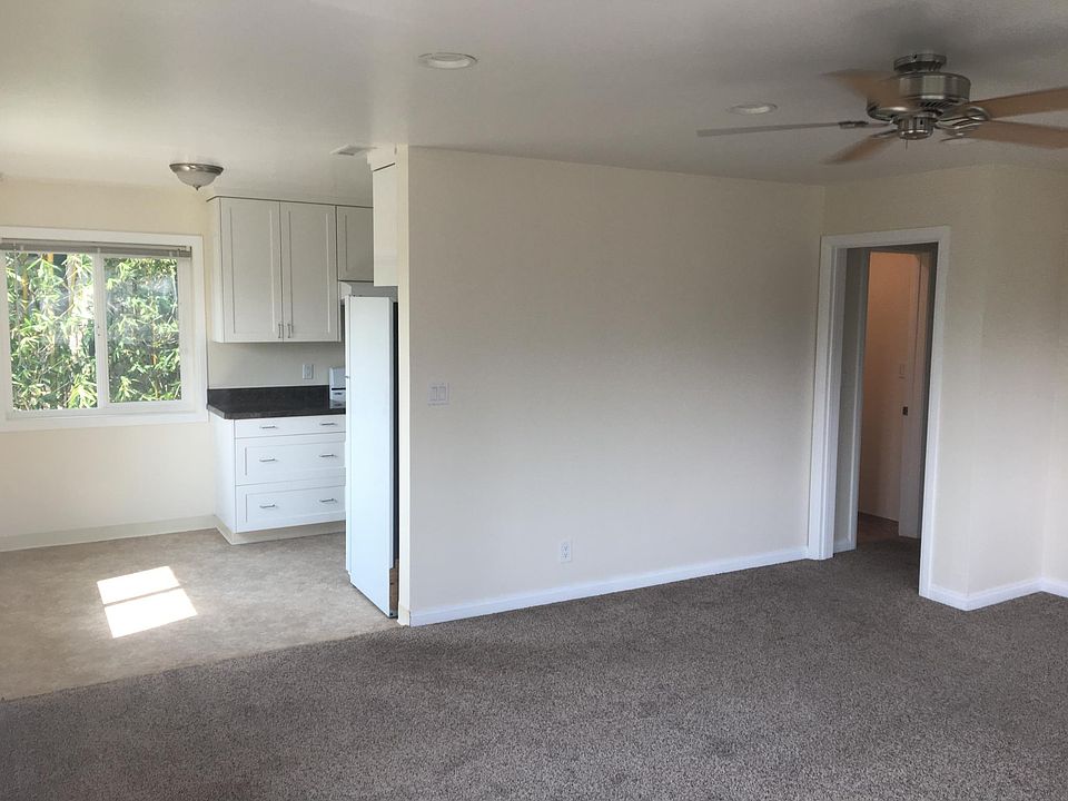 Living room view to kitchen dining area