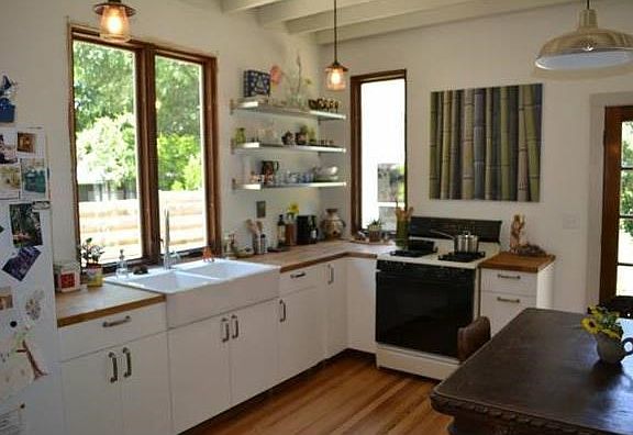 Kitchen with Pella Windows and farm house type sink