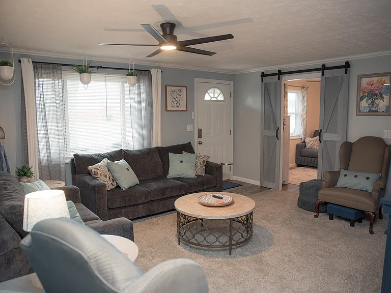A bright and airy welcome! Our open-concept layout ensures plenty of space for everyone to gather.
