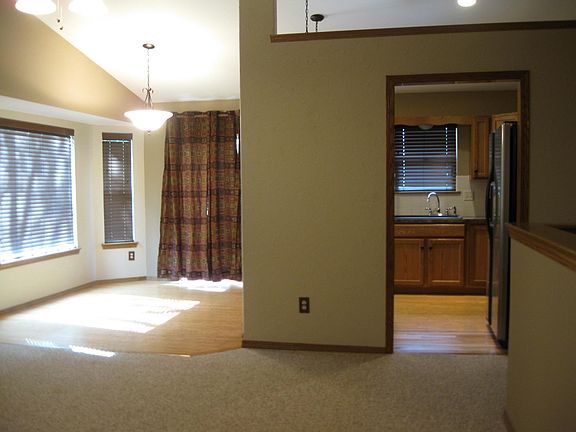  Living Room into Dining and Kitchen