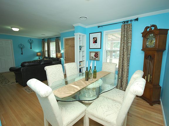 Elegant dining room which also includes hardwood flooring.