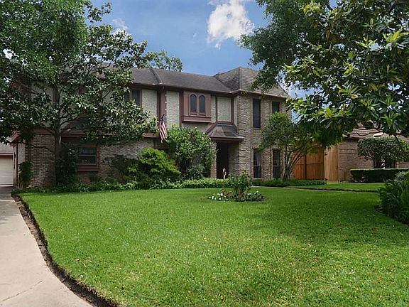 This view provides a look at the timeless architecture that is reminiscent of the estates you would 