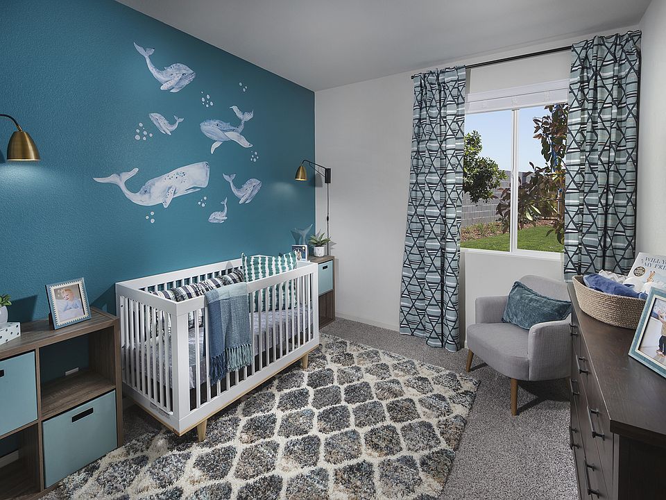 Residence 2 secondary bedroom modeled at a nearby Meritage community.