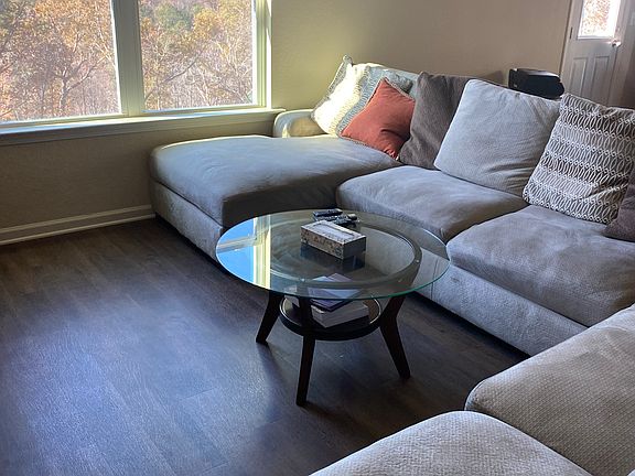 Part of the Living room (LR) area- Large sectional. This pic gives an idea of how spacious the LR area is here.