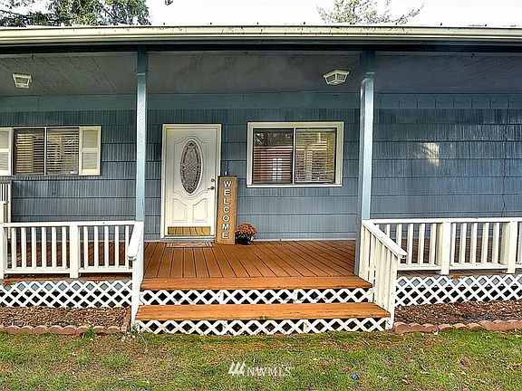 Covered front porch and great yard space.