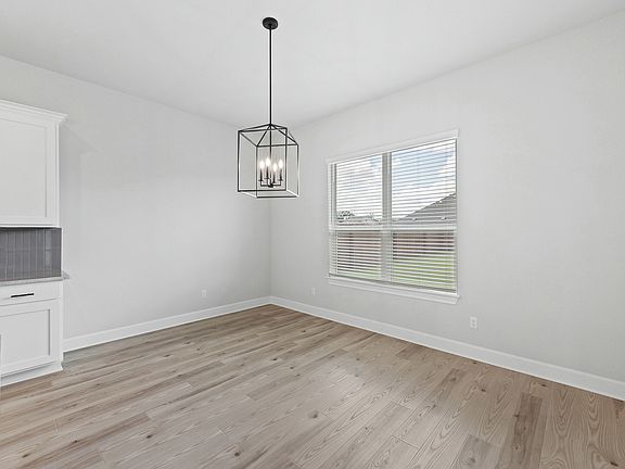 The family room sits right off of the kitchen.