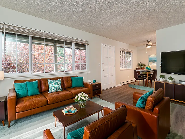 Explore this cozy living space featuring modern furnishings and abundant natural light. Explore this cozy living space featuring modern furnishings and abundant natural light.