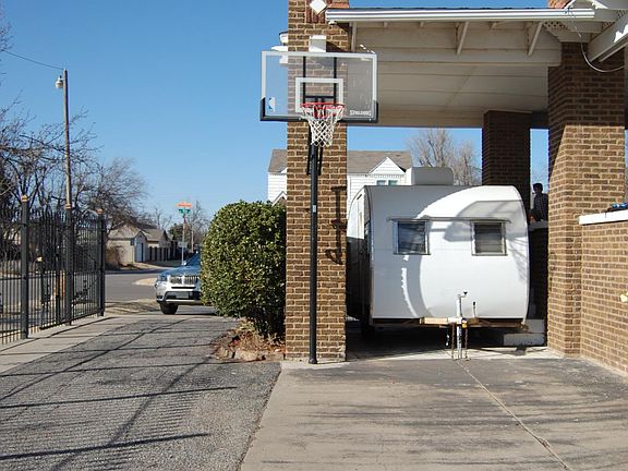 Portico for covered parking. This will fit a large car.