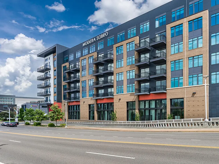 Upscale living meets Nashville energy at Modera SoBro _ a vibrant community rising in the heart of downtown.