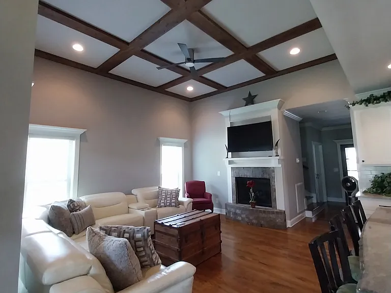 Gas Fireplace with light switch to turn on fire. 60" curved Samsung TV