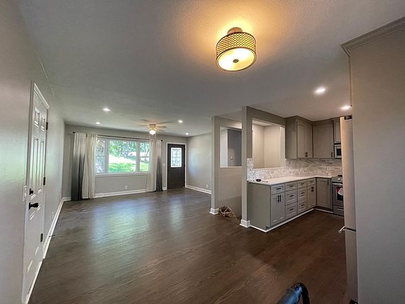 Designer fixtures throughout the sunlit home.