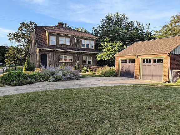 Back of home & 2-car garage
