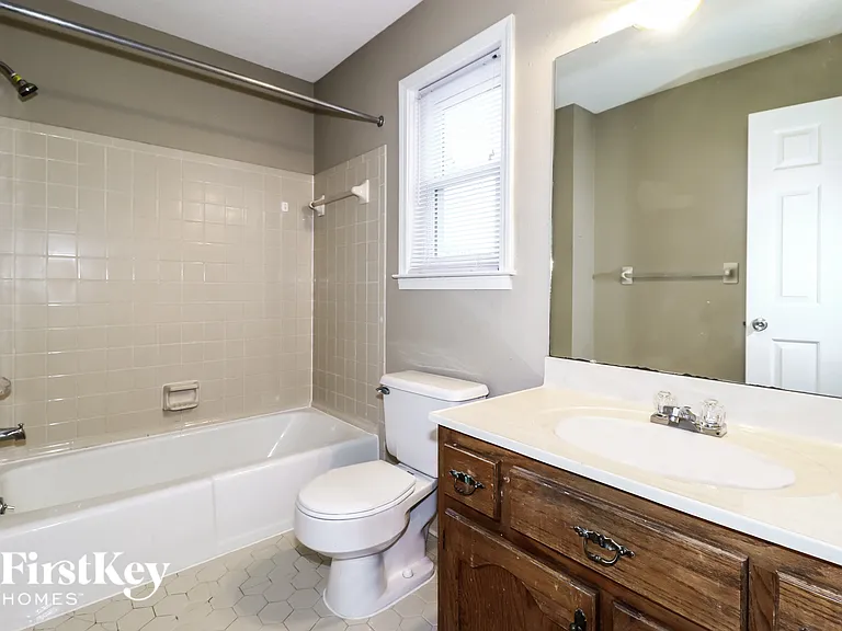 8117 S Regis Pl — Photo 14