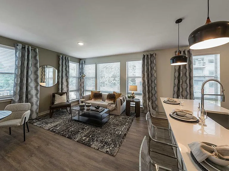 East Classic I open-concept kitchen, living, and dining areas with hard surface plank flooring