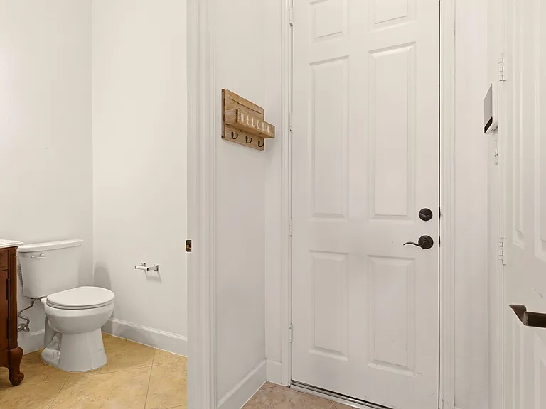1st floor bathroom to garage access and walk-in pantry