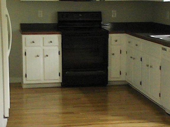 Eat in kitchen with hardwood floors