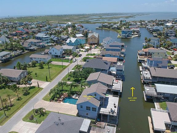 Located on a cul de sac street. Fabulous views of the wetlands and bay on wide canal.