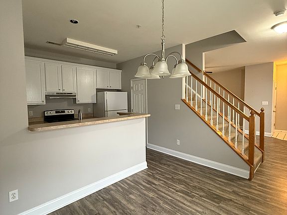 Dining Area, Kitchen, and Half-Bath Entrance