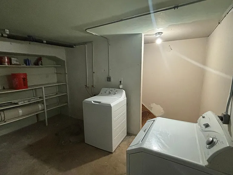 Private washer/dryer with storage area