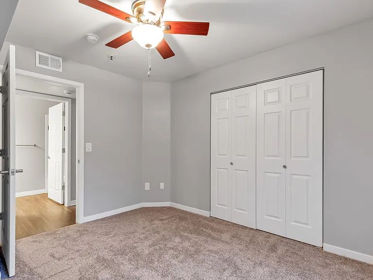 A Bedroom at The Buttes Apartment Homes in Loveland, CO