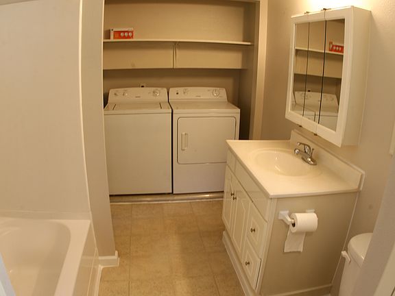 Bathroom with full-size wash