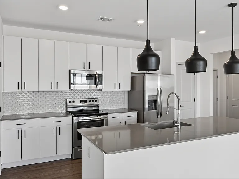 Cook, dine, and gather in a stylish kitchen space.