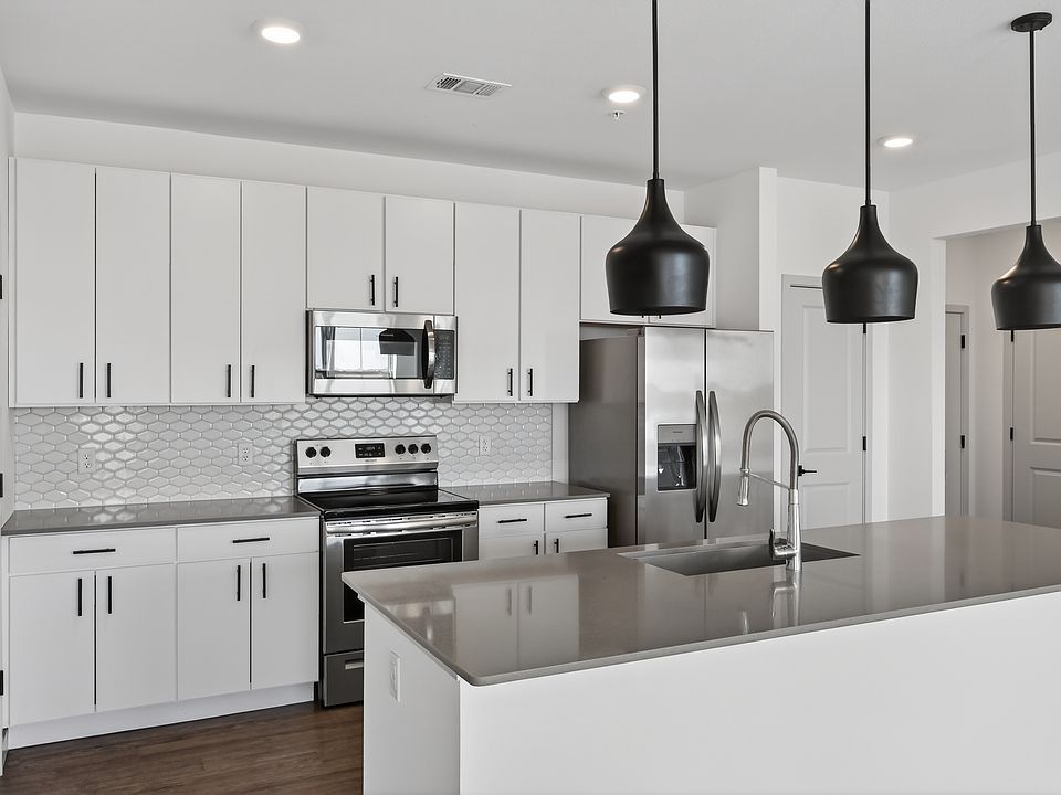 Cook, dine, and gather in a stylish kitchen space.
