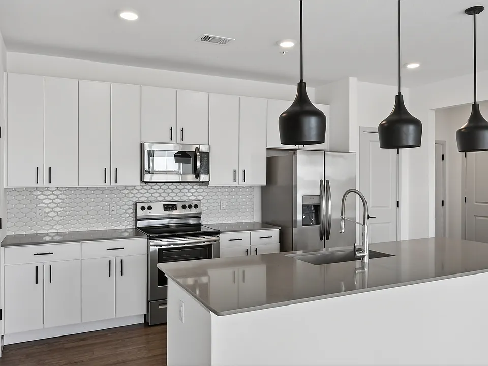 Cook, dine, and gather in a stylish kitchen space.
