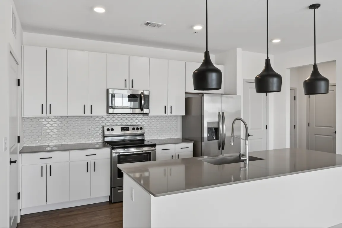 Cook, dine, and gather in a stylish kitchen space.