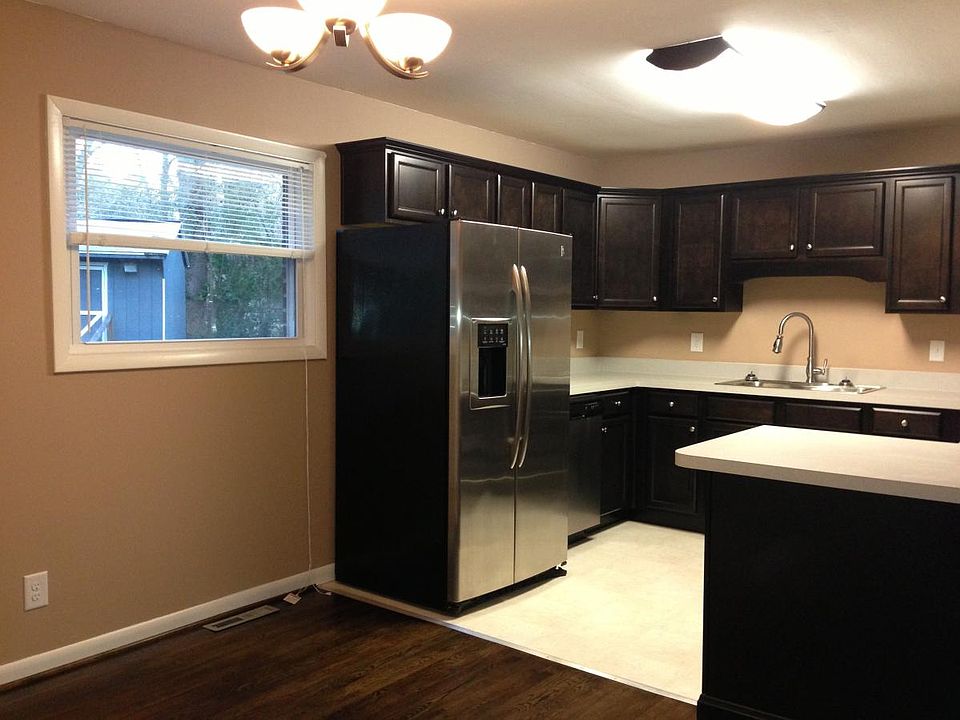 Kitchen with dining area. Storage shed in back yard.