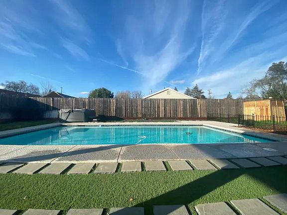 Experience ultimate luxury and relaxation with this stunning pool.