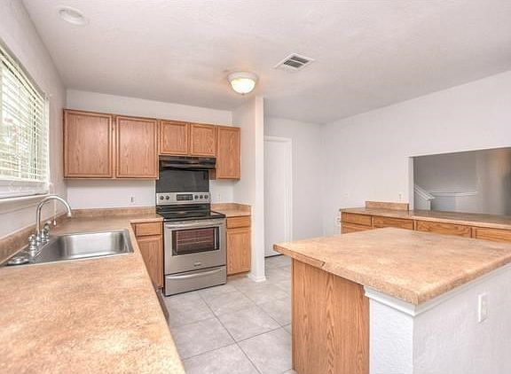 This is a great kitchen, with a very new dishwasher & smooth electric range. Plus a big double sink,