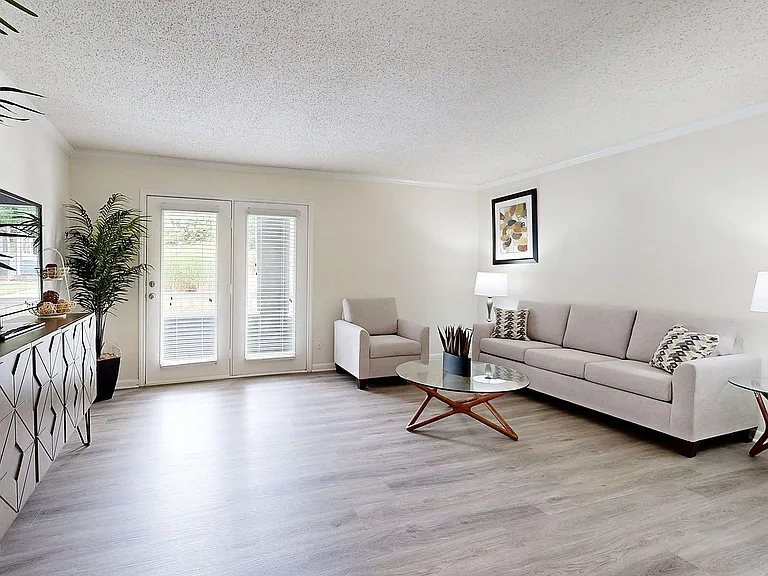 Spacious living room with hardwood-style flooring